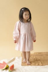 Váy khuy sau TinyBear màu hồng nhạt 4-5y